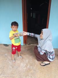 Penyaluran PMT Penanganan dan Pencegahan Balita Risiko Stunting di Kalurahan Giripanggung Hari ke-23