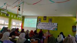 Kamituwa Giripanggung Hadiri Pembekalan dan Evaluasi PMT Lokal di Aula UPT Puskesmas Tepus II
